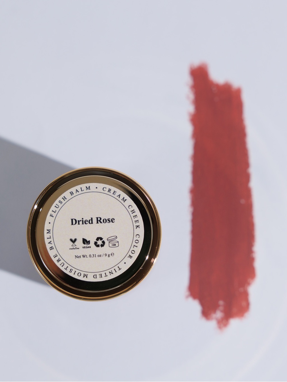Creme de la Creme Color Balm for Lips Eyes & Cheeks in Dried Rose.